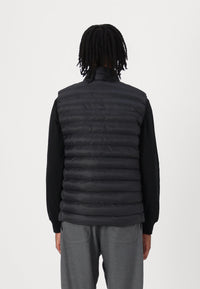 Doudoune sans manches homme Tommy Hilfiger noire – Gilet matelassé léger, confort, hiver mi-saison.