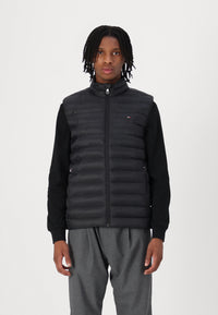 Doudoune sans manches homme Tommy Hilfiger noire – Gilet matelassé léger, confort, hiver mi-saison.