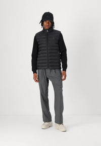 Doudoune sans manches homme Tommy Hilfiger noire – Gilet matelassé léger, confort, hiver mi-saison.